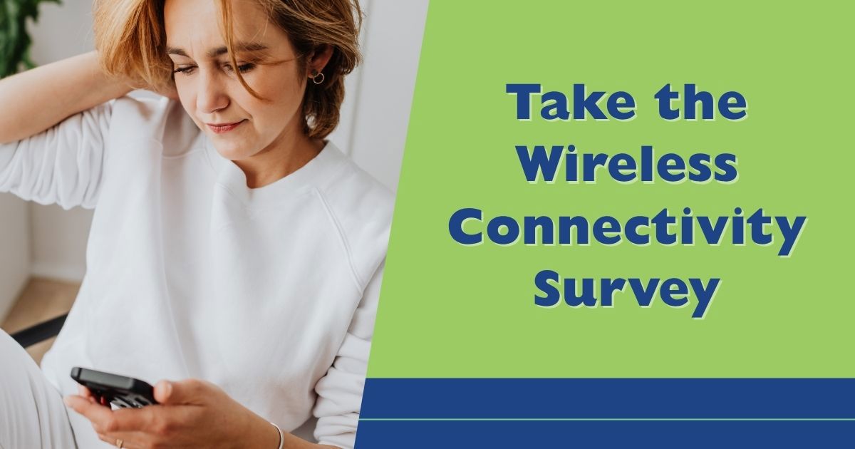 Woman looking at her cell phone with headline Share Your Experience with Wireless Coverage