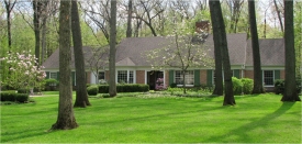 house with green lawn